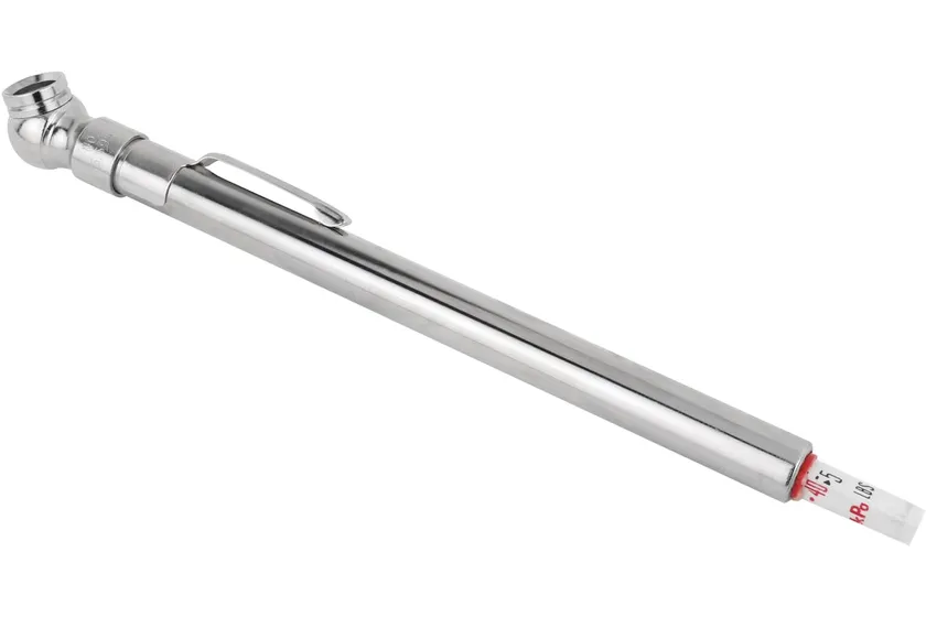 Milton S-921 plated brass pencil tire pressure gauge with a sliding white scale bar marked in PSI and kPa