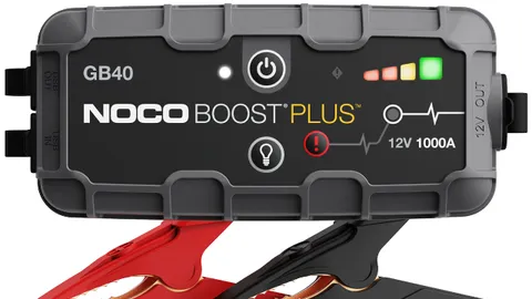 NOCO Boost GB40 portable lithium jump starter with battery clamps attached