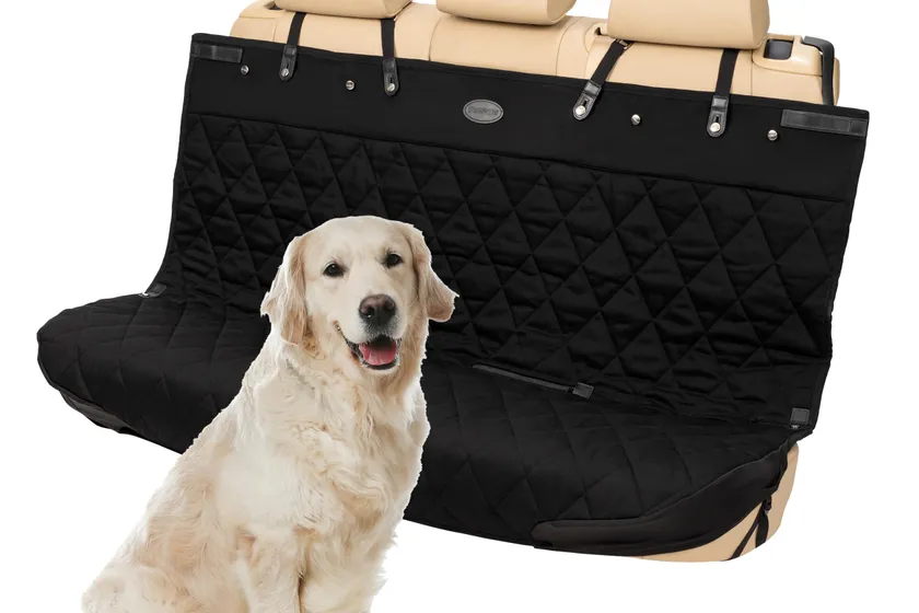 Gray PetSafe Happy Ride quilted bench seat cover protecting a rear car bench seat from pet hair and dirt