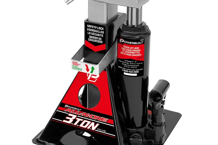 Powerbuilt 640912 black all-in-one bottle jack with a built in ratcheting jack stand and a wide flat base