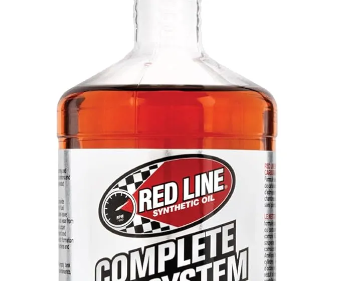 Red Line SI-1 Complete Fuel System Cleaner 15 ounce bottle with its blue and silver label
