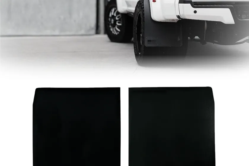 REK GEN Merica stainless steel dually mud flaps with black flag graphic on a heavy duty truck
