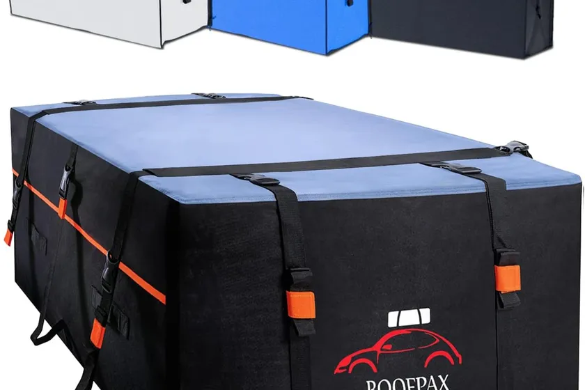 RoofPax XXL black waterproof rooftop cargo bag with ten tie-down straps loaded on top of an SUV without a roof rack
