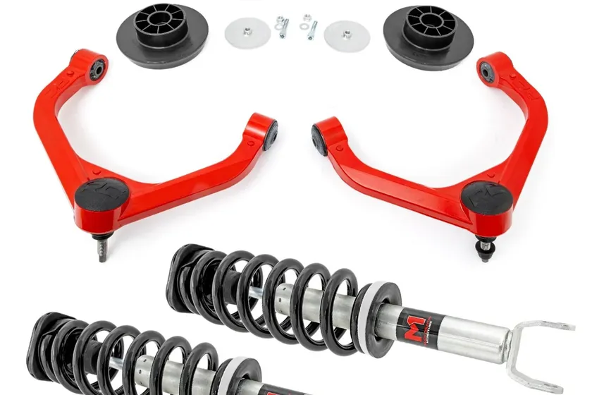 Rough Country 3.5 inch Ram 1500 lift kit with red aluminum control arms and M1 monotube performance struts