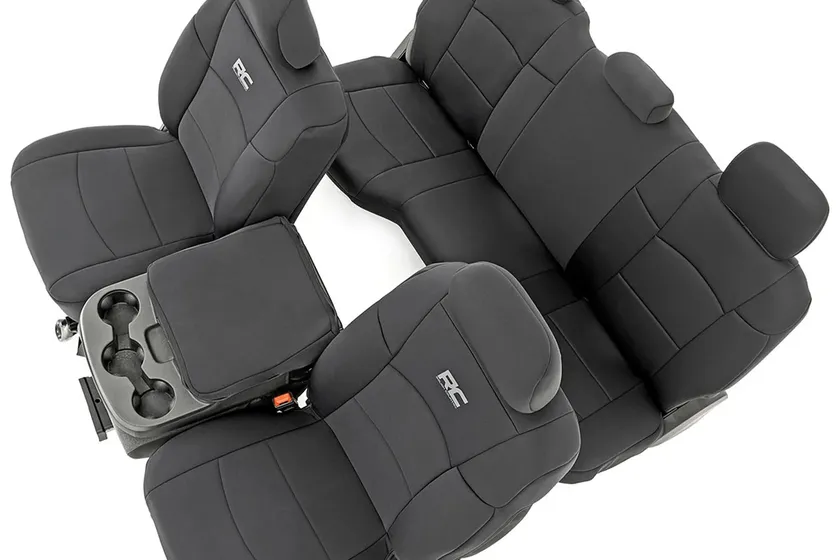 Rough Country black neoprene front and rear seat covers fitted in a 2019 to 2024 Ram 2500 crew cab
