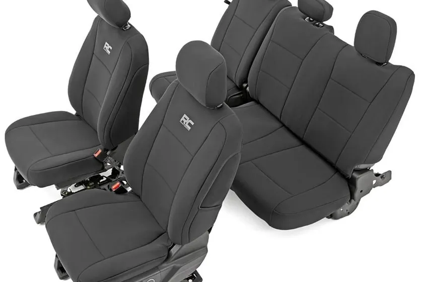Rough Country black neoprene front and rear seat covers installed on Ford F-150 crew cab seats