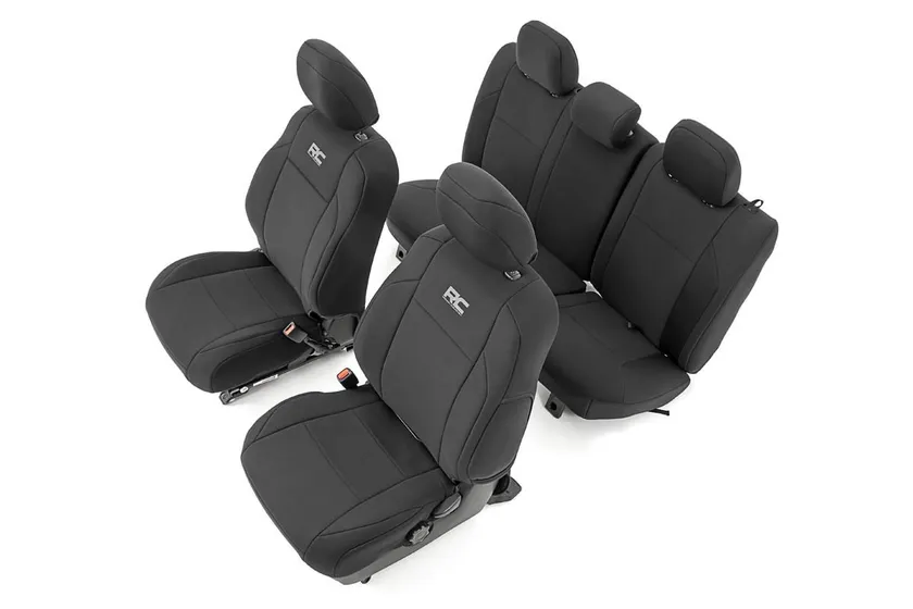 Rough Country black neoprene front and rear seat covers for the 2016-2023 Toyota Tacoma