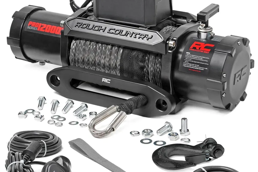 Rough Country PRO12000S electric winch in black with gray synthetic rope and roller-free hawse fairlead