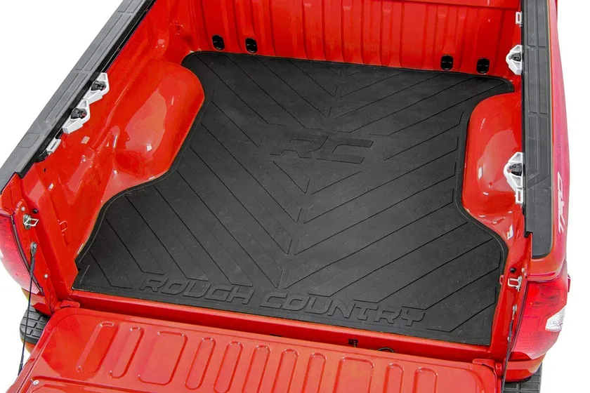 Rough Country heavy-duty rubber truck bed mat fitted to a Chevy Silverado 1500 5 foot 10 inch bed
