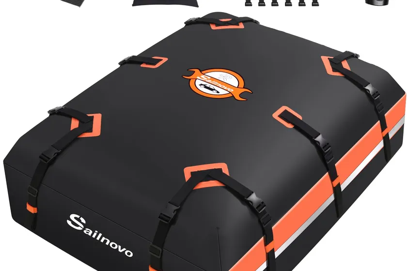 Sailnovo black waterproof soft rooftop cargo bag strapped to the roof of a car
