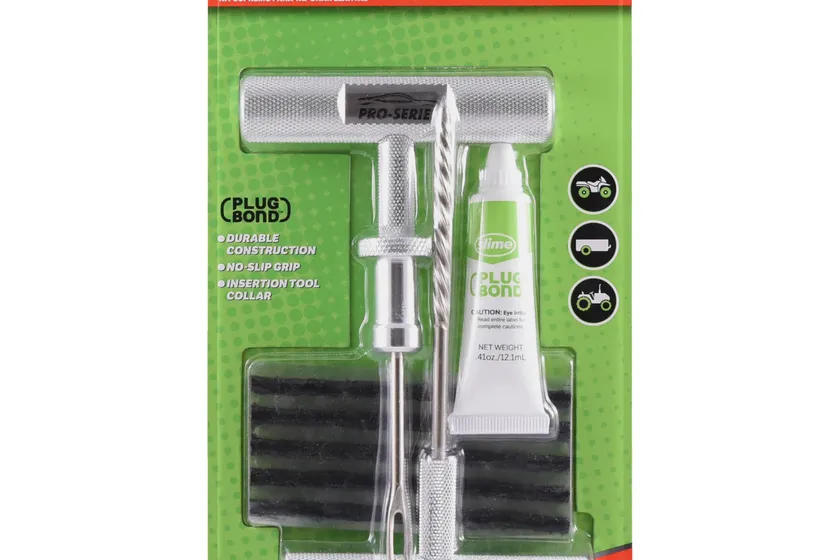 Slime Pro Series tire plug kit with aluminum T-handle reamer and plugger, repair strings and a tube of Plug Bond