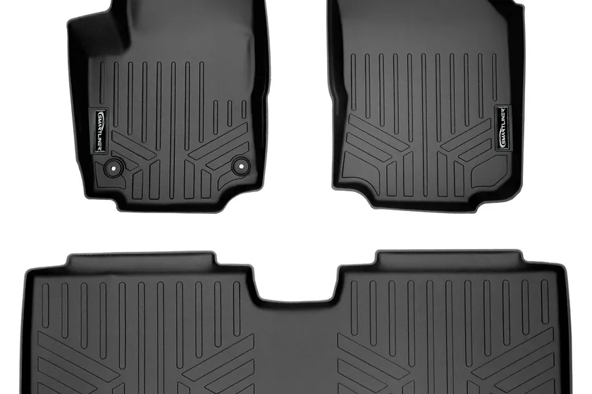 SMARTLINER custom fit two row black floor liner set with raised lip edges molded for an SUV