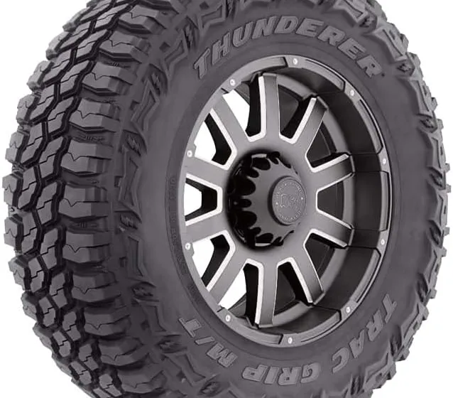 Thunderer Trac Grip M/T R408 mud-terrain tire showing wide open lugs with large gaps between the tread blocks