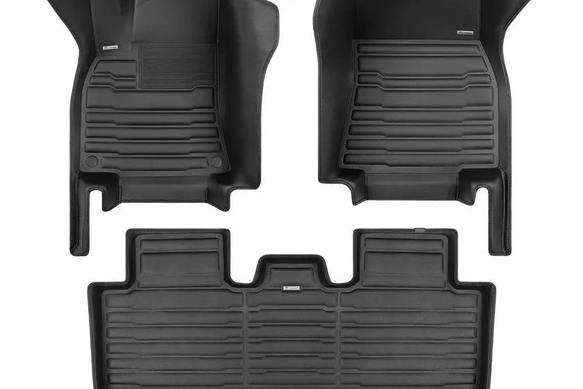 TuxMat black custom fit floor mat set for the Tesla Model Y 5-seater with tall side walls reaching the door sills
