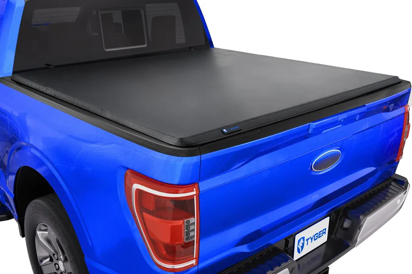 Tyger Auto T3 soft tri-fold tonneau cover in black vinyl shown closed on a Ford F-150 short bed