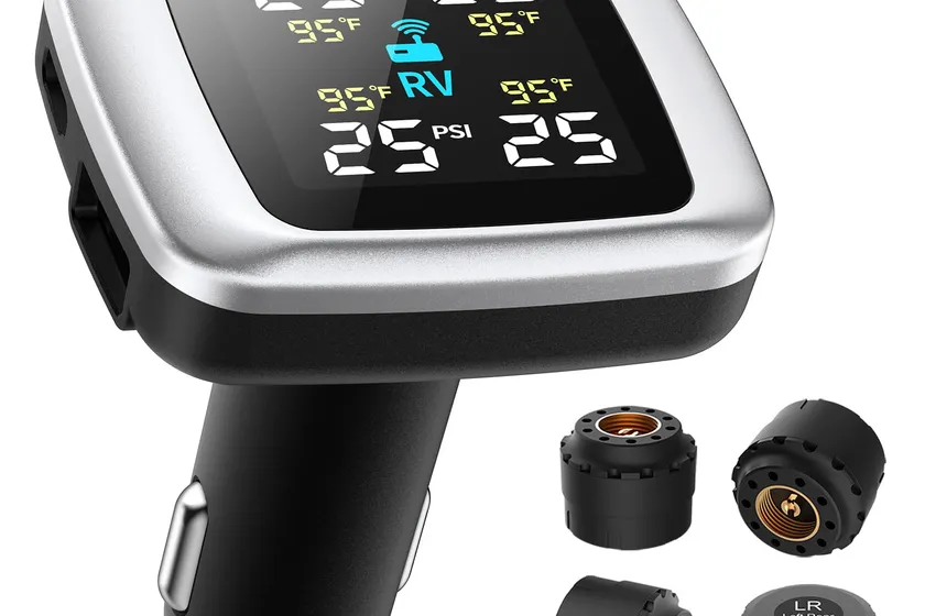 Tymate TM7 tire pressure monitor with a large color screen showing four tire readings next to its external sensors