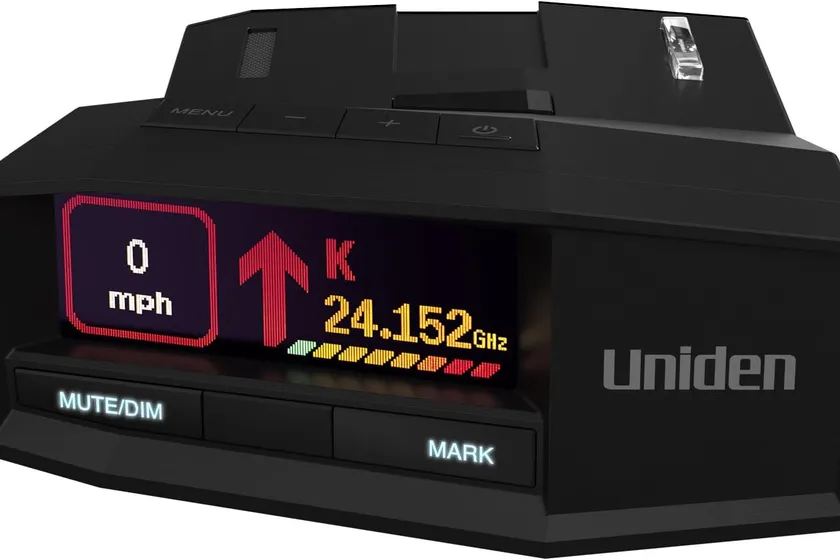 Uniden R8W windshield radar detector showing its directional arrow display and mount
