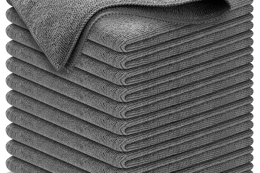 Stack of grey USANOOKS 300 GSM microfiber cleaning cloths from the 12 pack