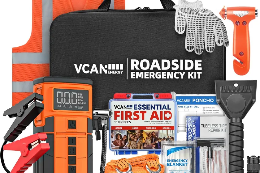 VCANENERGY roadside emergency kit with a black jump starter and air compressor unit, clamps, tow rope and first aid pouch in a rugged case