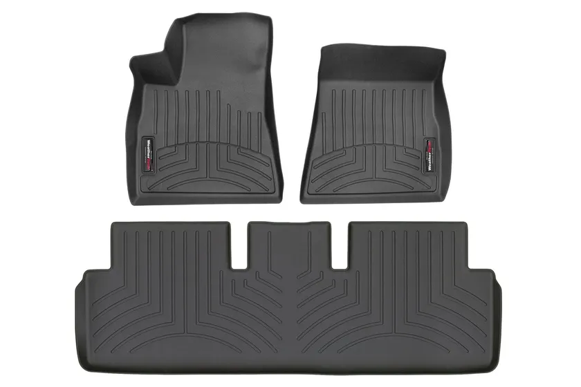 WeatherTech Custom Fit FloorLiner set in black for the Tesla Model 3 showing molded first and second row liners with raised perimeter walls