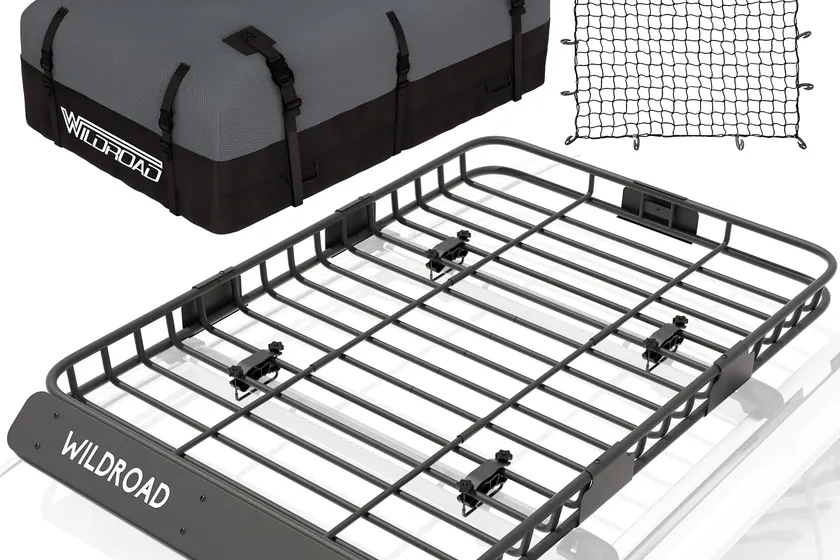 Wildroad steel roof cargo basket holding a black waterproof cargo bag with a net over the top